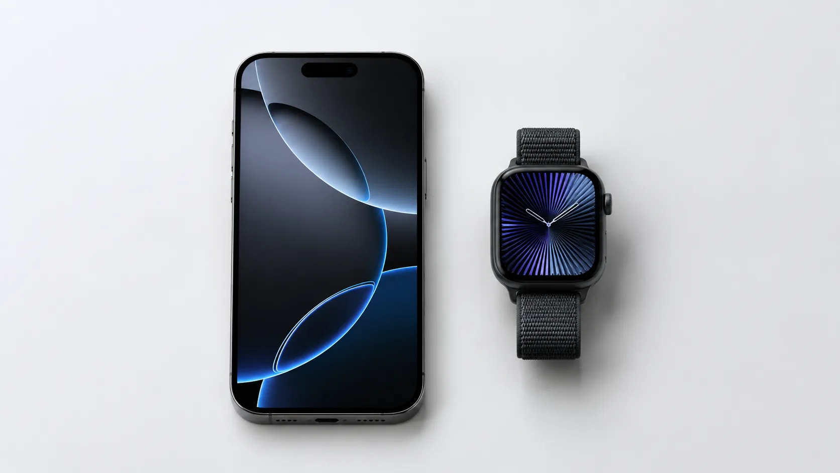 iPhone 16 Pro and Apple Watch showing Apple OS 27 interface side by side on white surface