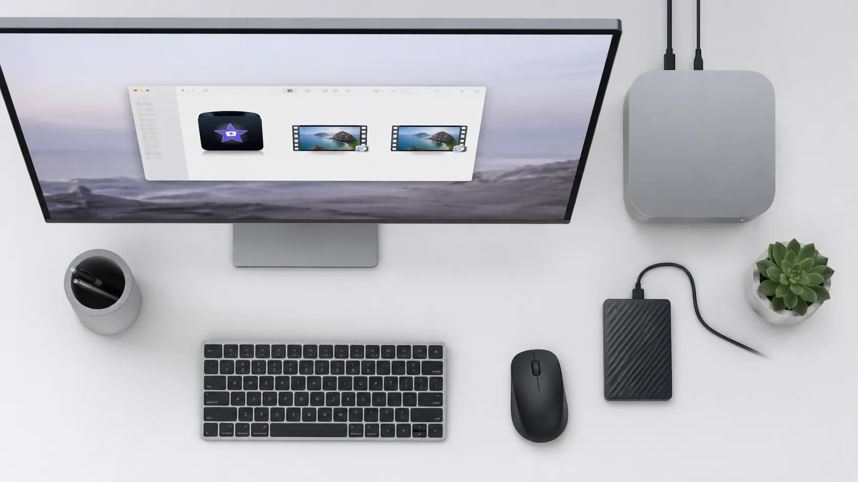 Finder window displaying iMovie library file and exported video files on external drive