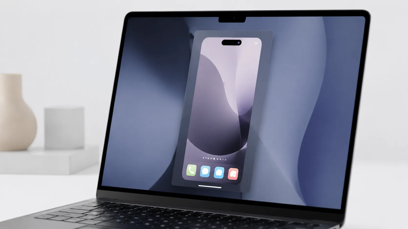 MacBook screen showing iPhone Mirroring window with Dynamic Island visible in macOS Sequoia